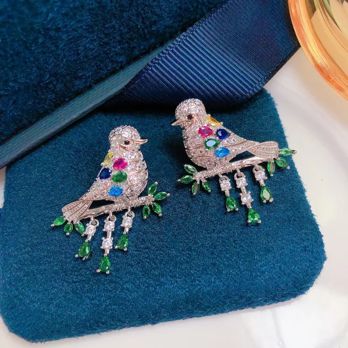 Songbird Crystal Earrings with Green Teardrop Accents
